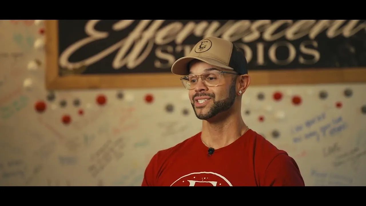 Michael Wooten speaking inside Effervescent Studios in the We Are Retail profile